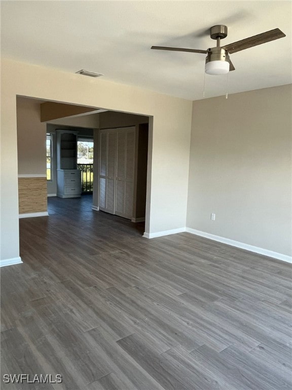 6824 Sandtrap Dr Unit 4, Fort Myers, FL 33919 - unfurnished room featuring dark wood finished floors, baseboards, visible vents, and ceiling fan