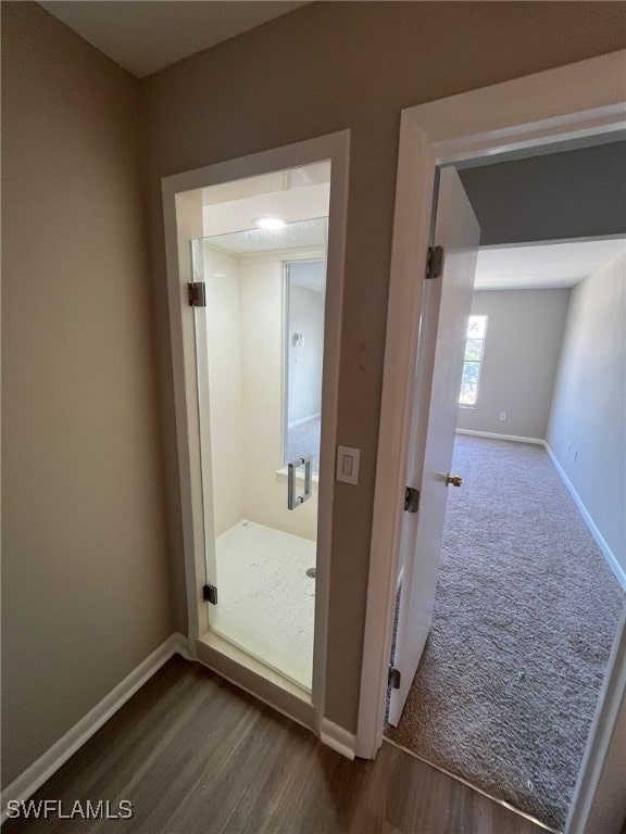 6824 Sandtrap Dr Unit 4, Fort Myers, FL 33919 - hallway featuring baseboards and dark wood-style floors