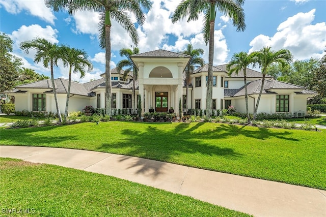 4300 Brynwood Dr, Naples, FL 34119 - view of front of property featuring stucco siding and a front yard