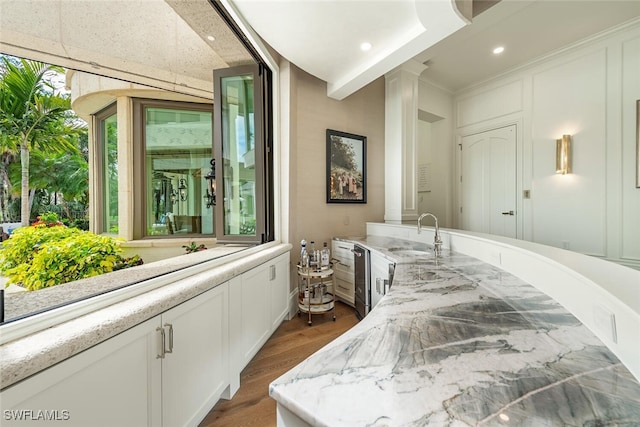4300 Brynwood Dr, Naples, FL 34119 - bathroom with a sink, recessed lighting, ornate columns, and wood finished floors