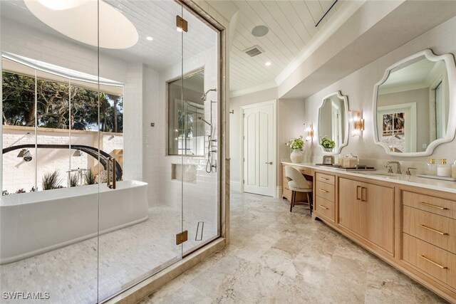 4300 Brynwood Dr, Naples, FL 34119 - bathroom featuring a shower stall, a soaking tub, vanity, and visible vents