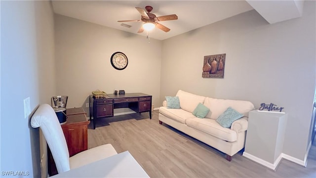 14512 Abaco Lakes Dr Unit 103, Fort Myers, FL 33908 - living area with baseboards, ceiling fan, and light wood finished floors