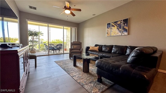 14512 Abaco Lakes Dr Unit 103, Fort Myers, FL 33908 - living room with visible vents, ceiling fan, and lofted ceiling