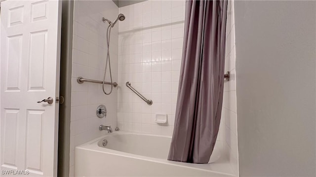 14512 Abaco Lakes Dr Unit 103, Fort Myers, FL 33908 - bathroom featuring shower / bath combination with curtain