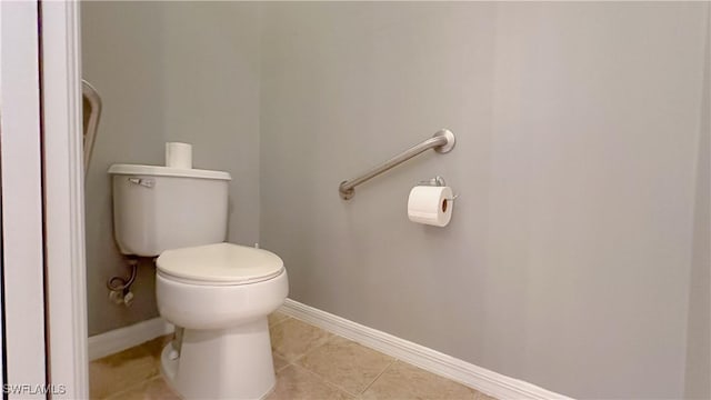 14512 Abaco Lakes Dr Unit 103, Fort Myers, FL 33908 - bathroom featuring tile patterned flooring, toilet, and baseboards