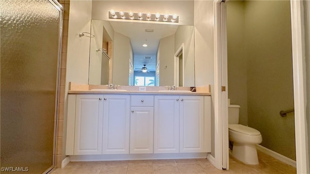 14512 Abaco Lakes Dr Unit 103, Fort Myers, FL 33908 - full bathroom featuring a sink, toilet, tile patterned flooring, and a stall shower
