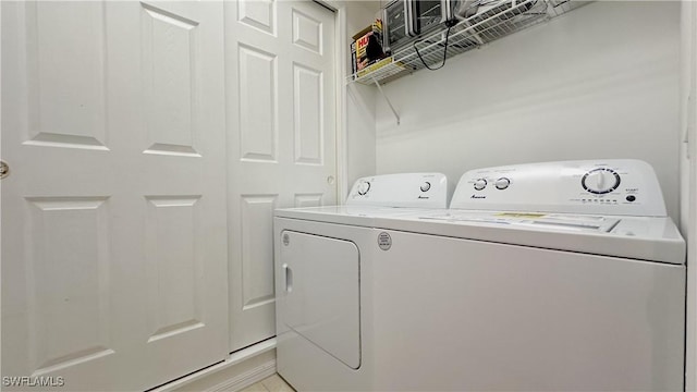 14512 Abaco Lakes Dr Unit 103, Fort Myers, FL 33908 - laundry room with laundry area and washer and clothes dryer