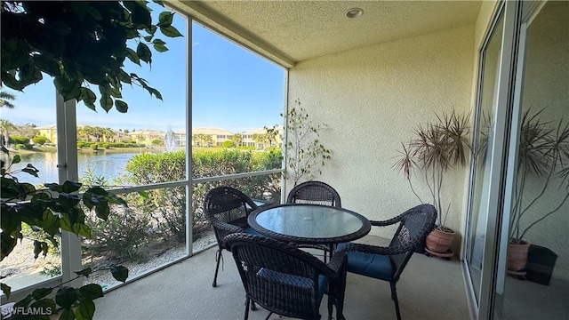 14512 Abaco Lakes Dr Unit 103, Fort Myers, FL 33908 - sunroom with a water view