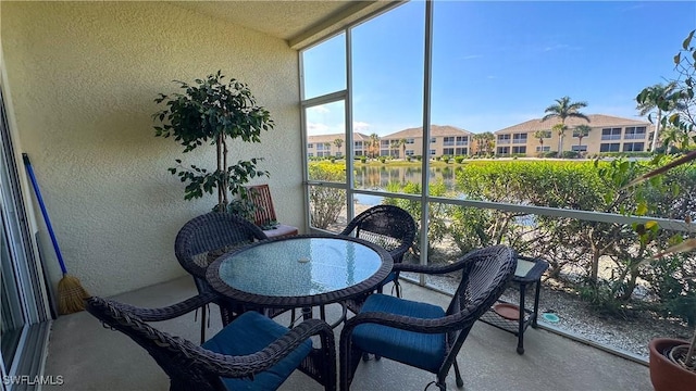14512 Abaco Lakes Dr Unit 103, Fort Myers, FL 33908 - sunroom with a residential view