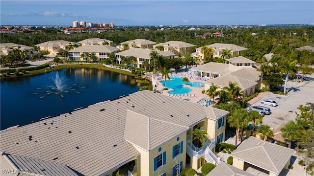 14512 Abaco Lakes Dr Unit 103, Fort Myers, FL 33908 - drone / aerial view with a residential view and a water view