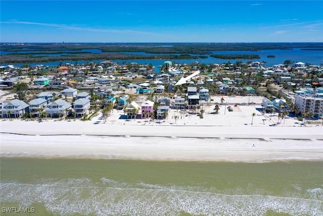 aerial view featuring a residential view and a water view
