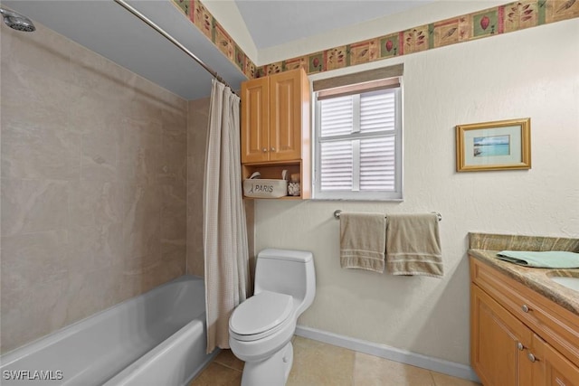 bathroom featuring baseboards, toilet, vanity, shower / tub combo with curtain, and tile patterned flooring