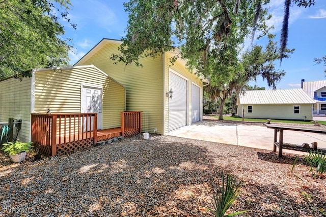 17150 Scout Camp Rd, Alva, FL 33920 - exterior space with a garage and concrete driveway