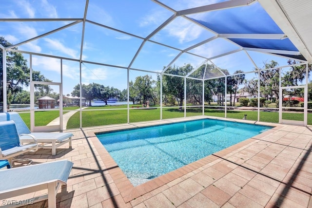 17150 Scout Camp Rd, Alva, FL 33920 - outdoor pool featuring glass enclosure, a yard, and a patio area