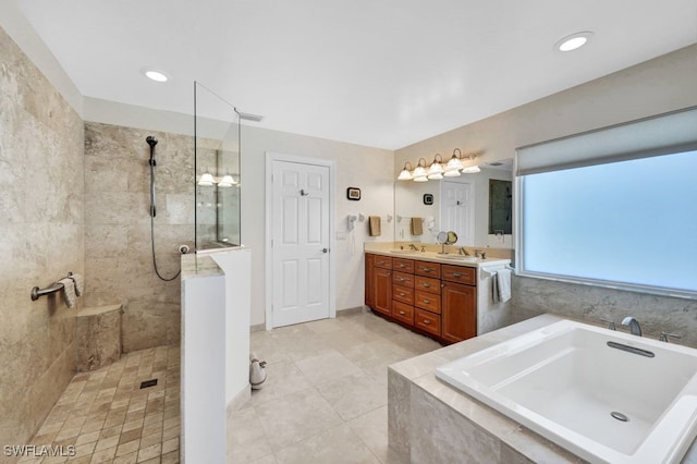 17150 Scout Camp Rd, Alva, FL 33920 - full bath with double vanity, a sink, a garden tub, and walk in shower