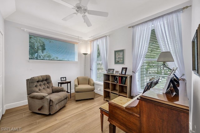 17150 Scout Camp Rd, Alva, FL 33920 - sitting room featuring baseboards, ceiling fan, and light wood-type flooring