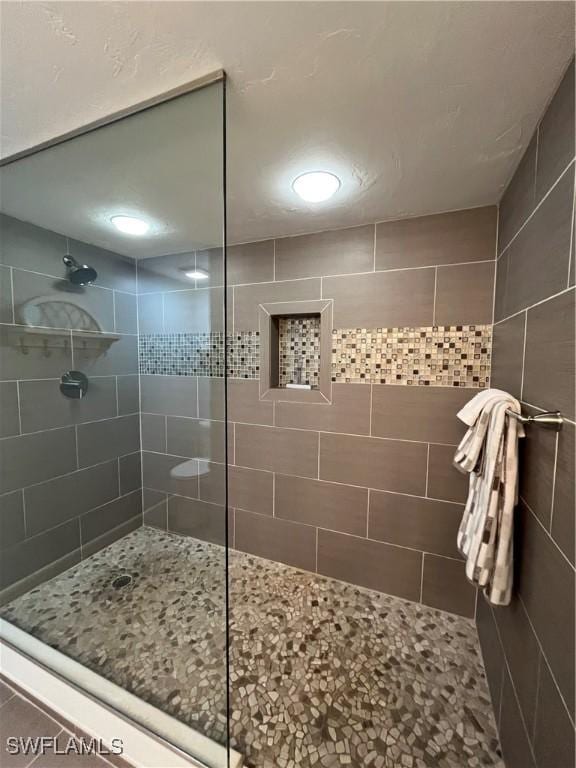 3661 Wild Pines Dr Unit 205, Bonita Springs, FL 34134 - bathroom featuring a walk in shower
