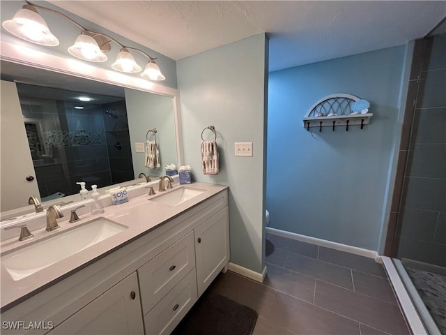 3661 Wild Pines Dr Unit 205, Bonita Springs, FL 34134 - full bathroom with a sink, tile patterned flooring, baseboards, and a tile shower