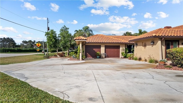 7090 Hendry Creek Dr, Fort Myers, FL 33908 - view of front of house with stucco siding, driveway, a garage, and a tile roof
