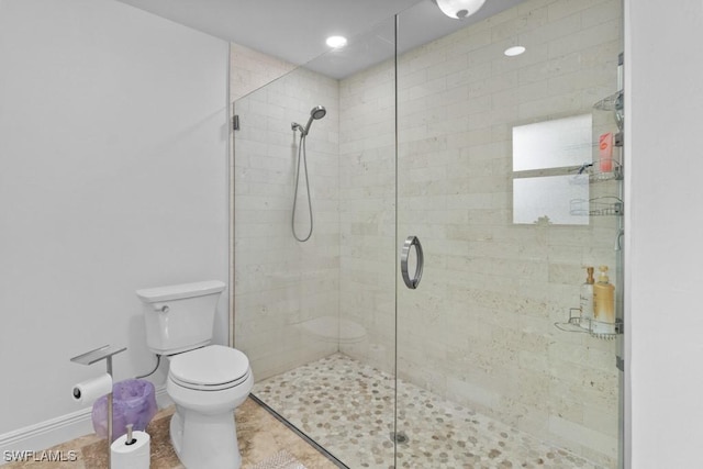7090 Hendry Creek Dr, Fort Myers, FL 33908 - full bathroom with toilet, baseboards, and a shower stall