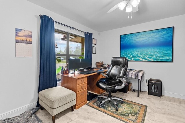 7090 Hendry Creek Dr, Fort Myers, FL 33908 - home office featuring baseboards and a ceiling fan