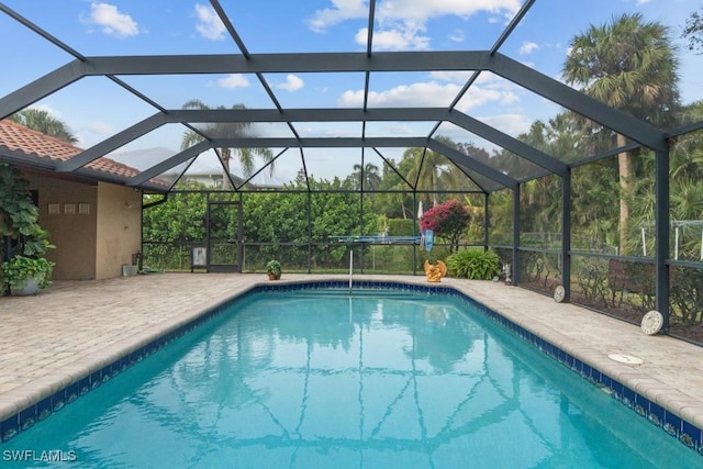 7090 Hendry Creek Dr, Fort Myers, FL 33908 - pool with glass enclosure and a patio