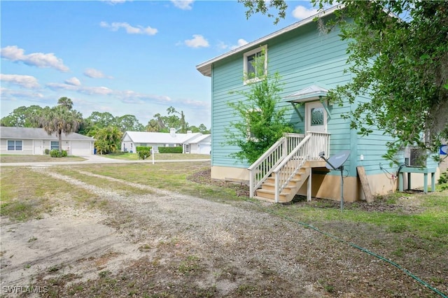 6070 Lacota Ave, Fort Myers, FL 33905 - exterior space with a garage