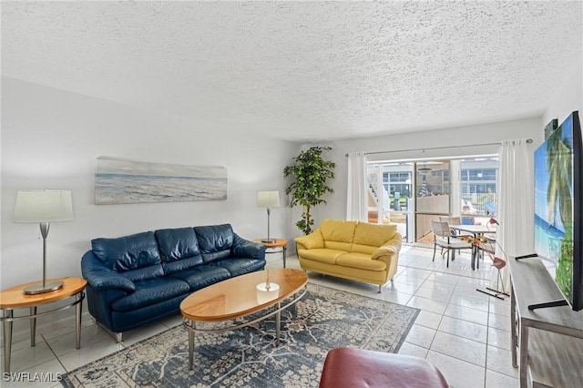 living area featuring a textured ceiling and tile patterned flooring