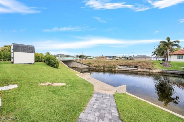 2590 Surfside Blvd, Cape Coral, FL 33914 - dock area featuring a water view and a yard