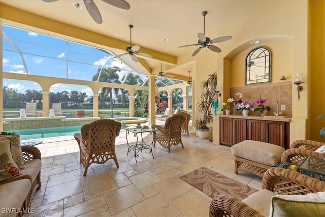 exterior space featuring an outdoor pool, outdoor lounge area, and a lanai