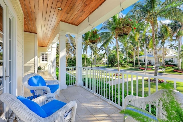 balcony featuring covered porch