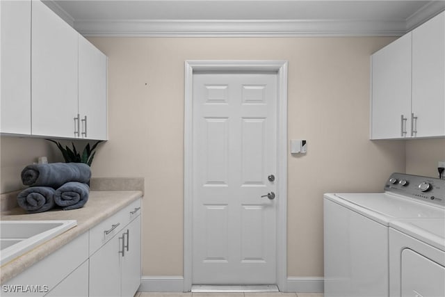 11476 Quail Village Way, Naples, FL 34119 - washroom with washing machine and dryer, cabinet space, and ornamental molding