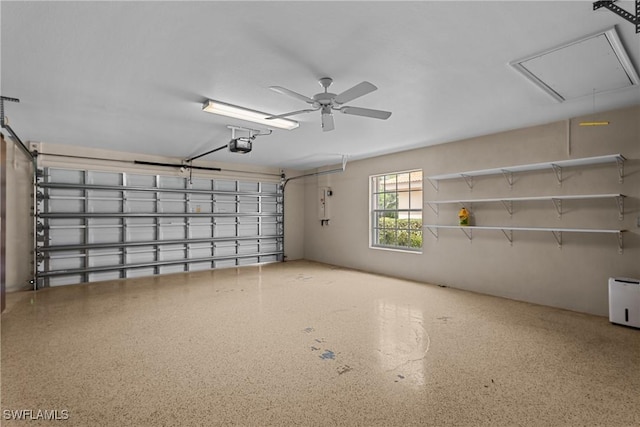 11476 Quail Village Way, Naples, FL 34119 - garage with a garage door opener and a ceiling fan