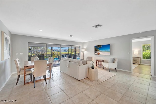 28389 Verde Ln, Bonita Springs, FL 34135 - living area with light tile patterned floors and baseboards