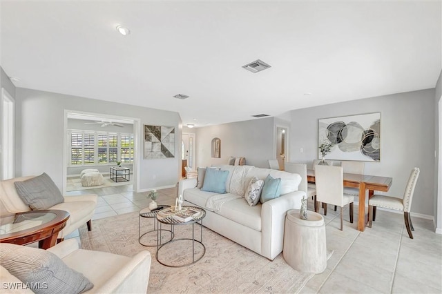 28389 Verde Ln, Bonita Springs, FL 34135 - living area featuring light tile patterned floors and baseboards