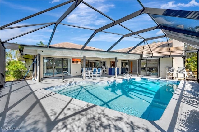 28389 Verde Ln, Bonita Springs, FL 34135 - outdoor pool featuring a patio, a jacuzzi, and glass enclosure
