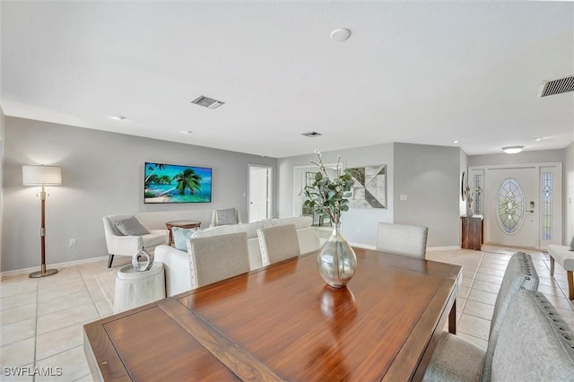 28389 Verde Ln, Bonita Springs, FL 34135 - dining area with light tile patterned floors and baseboards
