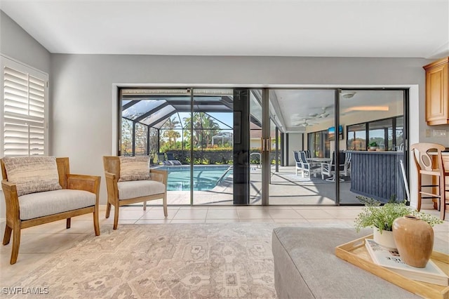 28389 Verde Ln, Bonita Springs, FL 34135 - living room featuring a sunroom and light tile patterned floors