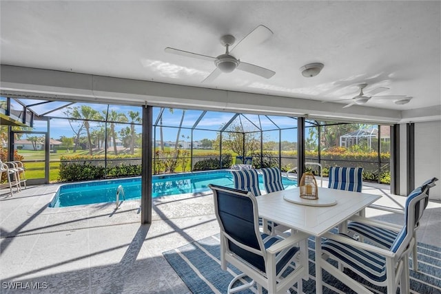28389 Verde Ln, Bonita Springs, FL 34135 - swimming pool featuring a patio area, ceiling fan, and glass enclosure