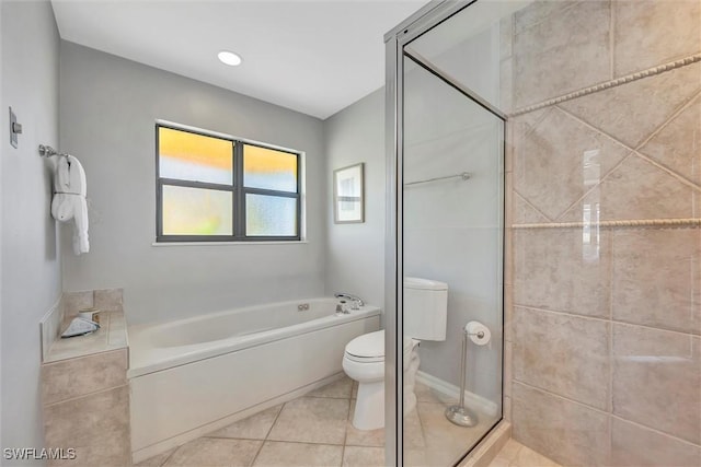 28389 Verde Ln, Bonita Springs, FL 34135 - bathroom with toilet, a bath, a stall shower, and tile patterned flooring