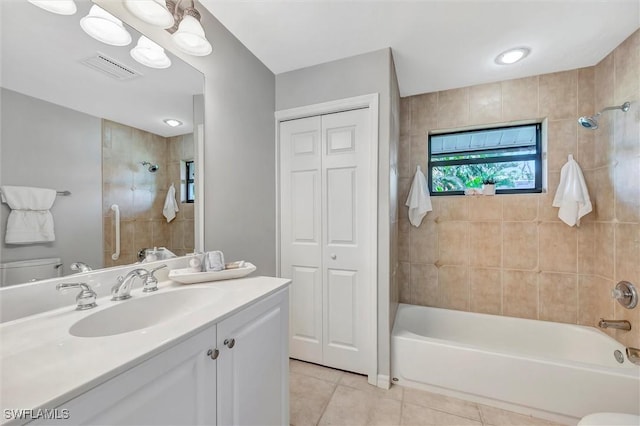 28389 Verde Ln, Bonita Springs, FL 34135 - full bath with toilet, tile patterned floors, vanity, and shower / tub combination