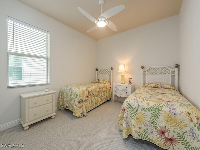 7826 Martino Cir, Naples, FL 34112 - bedroom with baseboards, ceiling fan, and light colored carpet