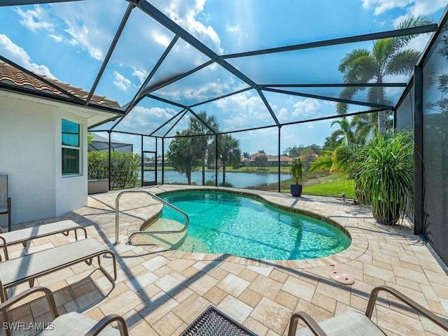 7826 Martino Cir, Naples, FL 34112 - outdoor pool with glass enclosure, a water view, and a patio area