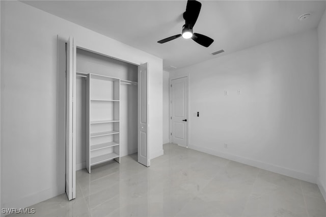 129 NE 5th Ter, Cape Coral, FL 33909 - unfurnished bedroom featuring baseboards, visible vents, a closet, and ceiling fan