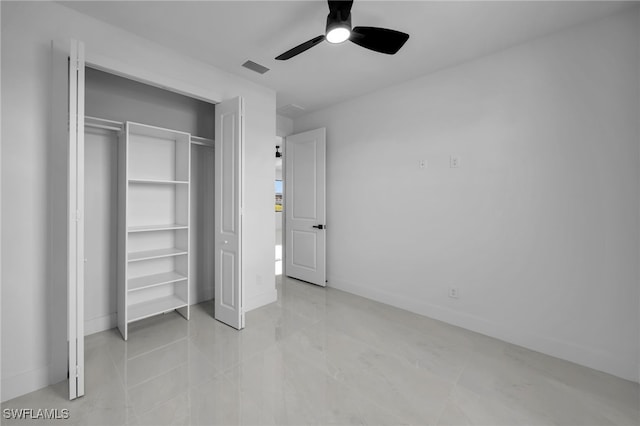 129 NE 5th Ter, Cape Coral, FL 33909 - unfurnished bedroom featuring baseboards, visible vents, a closet, and a ceiling fan