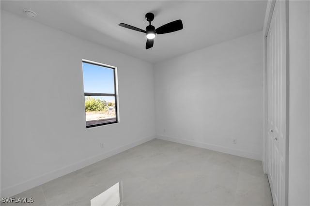 129 NE 5th Ter, Cape Coral, FL 33909 - unfurnished room featuring baseboards and a ceiling fan