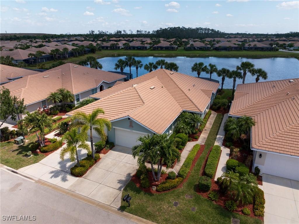 10449 Sirene Way, Fort Myers, FL 33913 - aerial view featuring a water view and a residential view