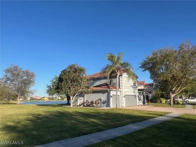 view of property exterior featuring a yard, an attached garage, a tiled roof, and concrete driveway