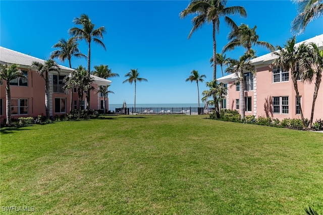 2401 Gulf Shore Blvd N Unit 13, Naples, FL 34103 - view of grassy yard featuring a water view