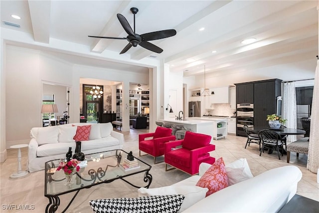 living area featuring visible vents, beamed ceiling, recessed lighting, ceiling fan with notable chandelier, and light tile patterned floors